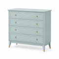 Commode en bois bleu clair avec poignées dorées