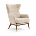 Fauteuil en tissu bouclé beige avec pieds en bois et laiton